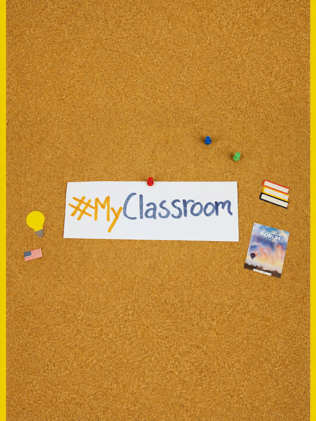 A #MyClassroom sign is pinned to a corkboard with books, a light bulb, a U.S. flag, and an English Teaching Forum cover.